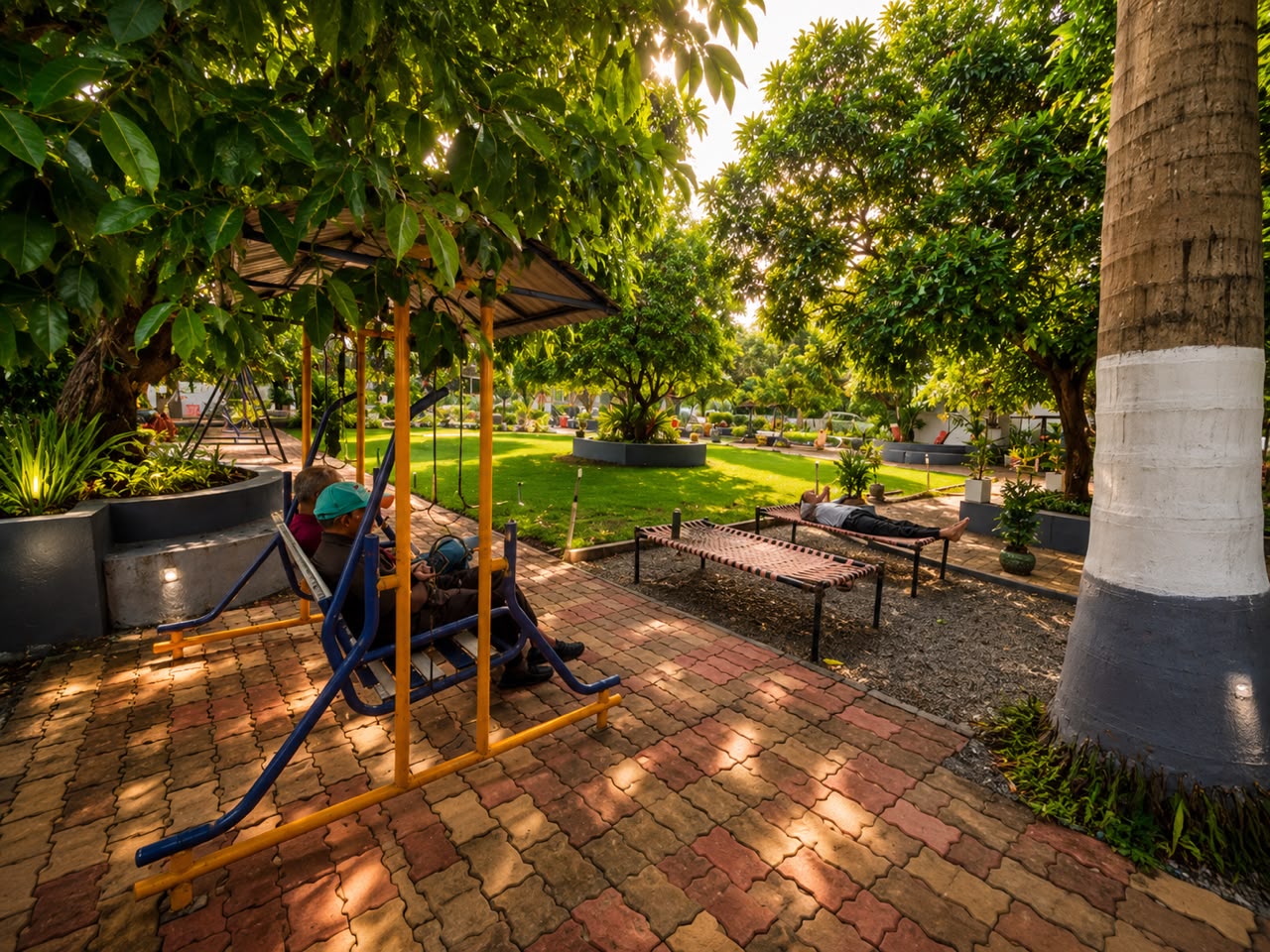 Garden pathway and lawns at Wildlife Gir Resort